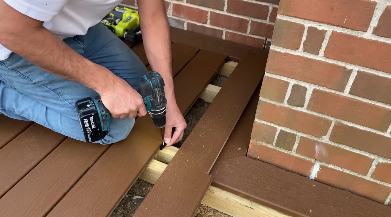 Professional deck installation process showing quality construction techniques